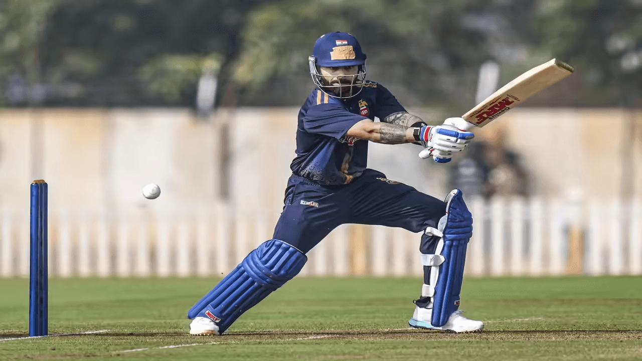 Kohli 77 Powers Delhi Past Gujarat in VHT Thriller